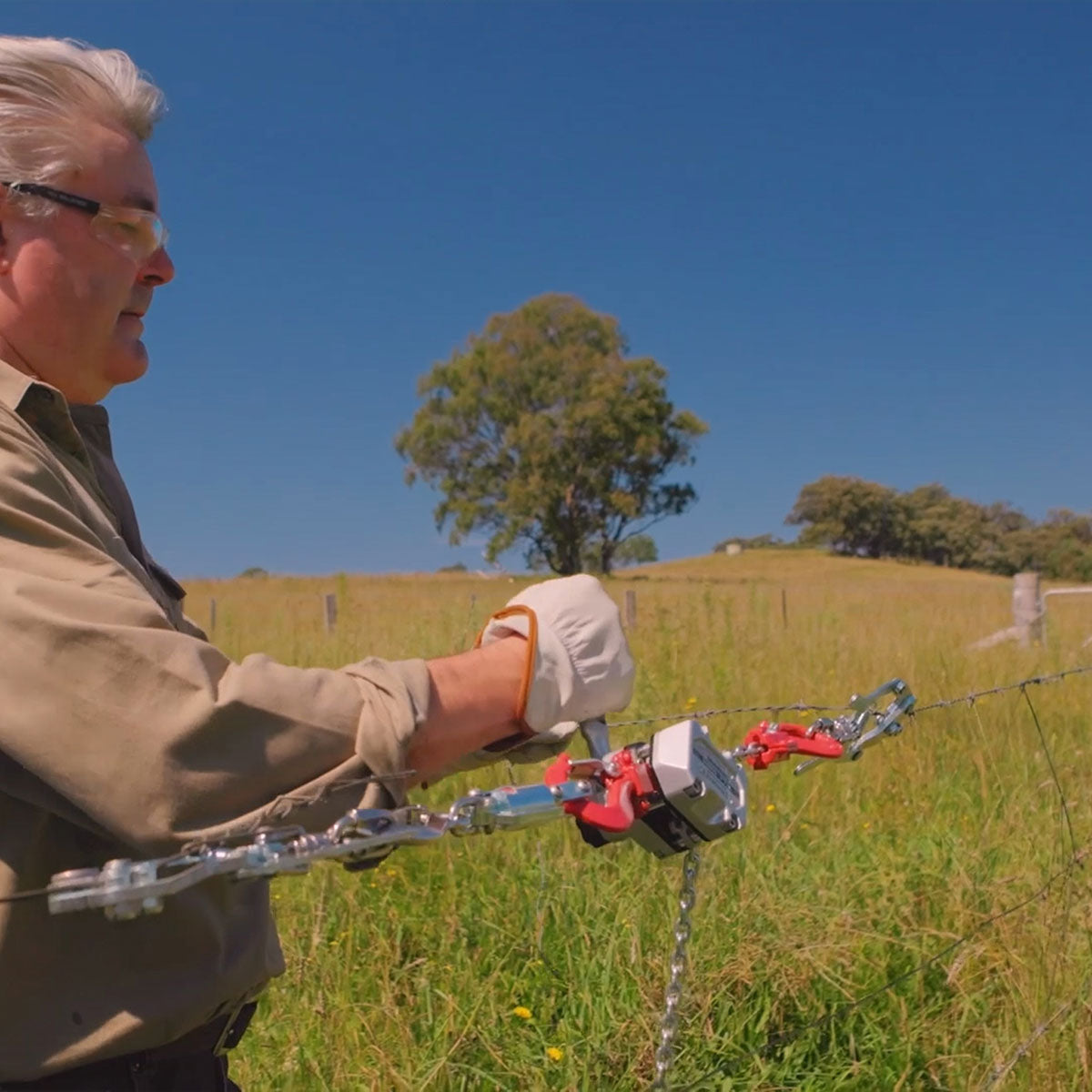 Strainex wire tensioner on fence